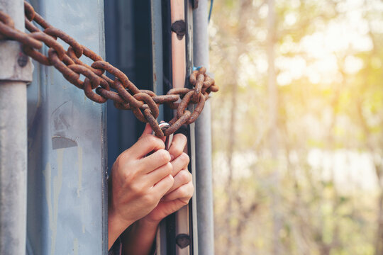Woman trapped in cargo container wait for Human Trafficking or foreigh workers, Woman holding master key wait for holp help, woman chained to her wrist