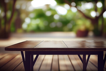 Table and chairs on green grass. A wooden table and bench in a park.