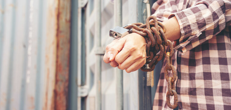 Woman trapped in cargo container wait for Human Trafficking or foreigh workers, Woman holding master key wait for holp help, woman chained to her wrist