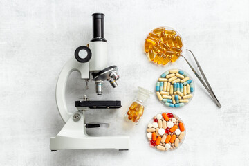 Medical drags quality research with microscope in microbialogical labaratory