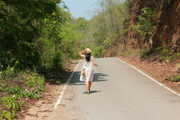 Fototapeta premium woman walking in the countryside