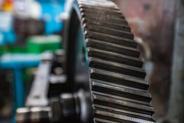 Locomotive drive gear closeup photo. Mechanical plant