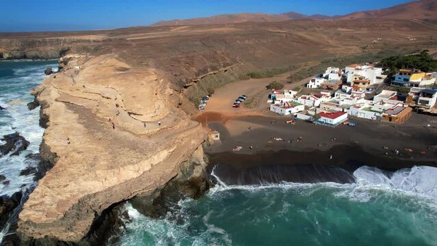 Fuerteventura island scenery - picturesque traditional fishing village Ajui, with black sand beaches. Canary islands of Spain
