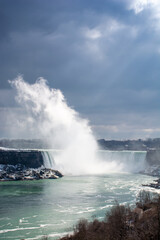 Stunning view of Niagara Falls in sunlight in Canada.