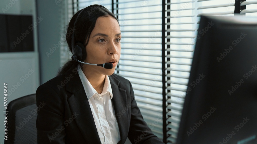 Aufkleber competent female operator working on computer and talking with clients. concept relevant to both cal