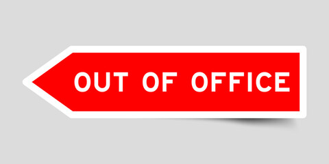 Red color arrow shape sticker label with word out of office on gray background