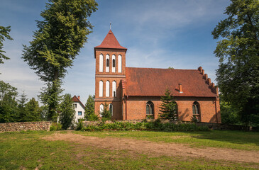 Gothic church in village Kuty, Masuria, Poland - 578351698