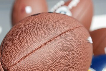A closeup view of a football, on display at a local retail store.