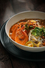 Popular Malaysia dish from Kuching, the Sarawak Laksa a spicy noodle soup type hawker food
