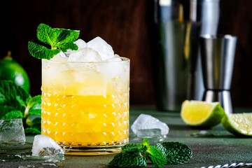 Mai Tai cocktail, refreshing drink with white rum, liqueur, sugar syrup, lime juice, mint and...