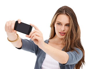 Fototapeta premium A tech-savvy user capturing a memorable moment for social media by taking a selfie with her cellphone, carefully examining the camera clarity isolated in a transparent PNG background.