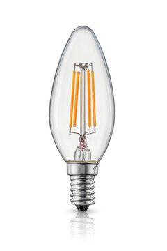 LED candle filament light bulb with e14 base isolated on white.