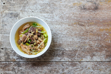 Boiled pig's blood soup. Thai Style Clear Soup with Congealed pork blood consisting of pork entrails and vegetables named Jing Chu Chai Is another popular breakfast in Thailand. Top view