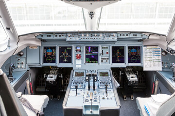 Inside the cockpit of a passenger aircraft