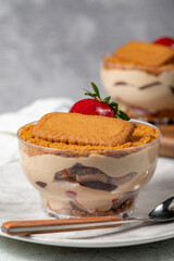 Homemade Strawberry Custard Pudding. Biscuit and strawberry dessert. Turkish magnolia dessert in glass bowl. Close up