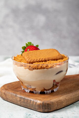 Homemade Strawberry Custard Pudding. Biscuit and strawberry dessert. Turkish magnolia dessert in glass bowl. Close up