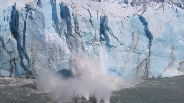Large chunks of ice break off the Perito Moreno Glacier and fall into the lake. El Calafate Patagonia Argentina