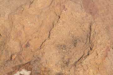 The background image of the rough rough granite surface is not smooth.