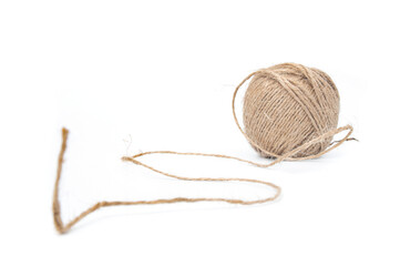 Ball of twine close up on a white background