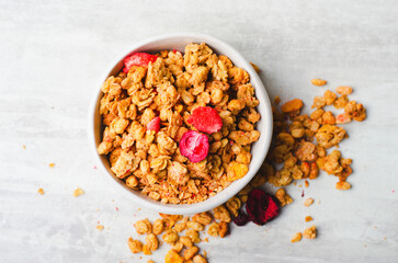Granola with Dried Berries on Bright Concrete Background, Healthy Vegan Snack or Breakfast