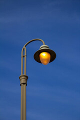 Fototapeta na wymiar Street lamp on sky.