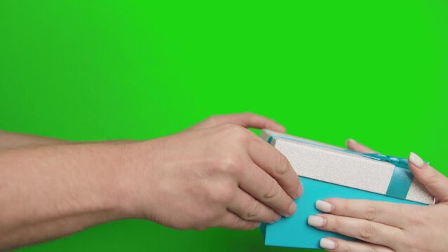 Unboxing a Gift: Excited Man Finds a Surprise Dollar Bill on Chroma Key Background