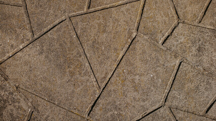 Texture of designer concrete facade with triangles.