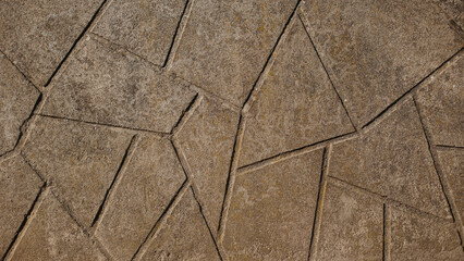 Texture of designer concrete facade with triangles.
