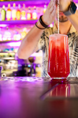 man hand bartender making cocktail in glass on the bar counter