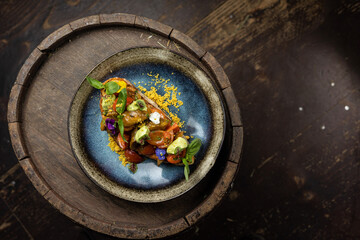 delicious vegetarian bruschetta with cheese, tomatoes, greens, avocado 

