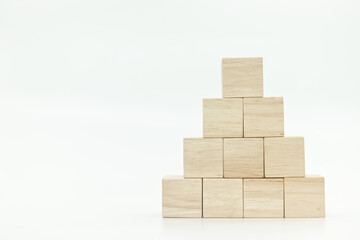 wooden blank block cubes arranged in pyramid shape on white background.
