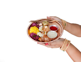 Pooja Thali woman hand holding decorated thali Decorated Pooja Thali for festival