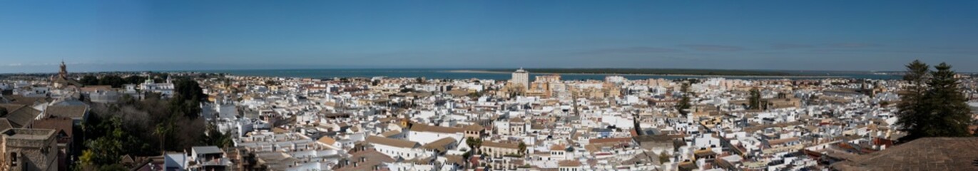 Fototapeta na wymiar Large panoramic shot of Sanlucar de Barrameda, a tourist and historical town in the province of Cadiz, in Andalusia, southern Spain