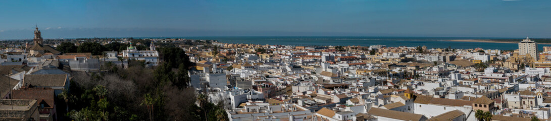 Fototapeta na wymiar Panoramic shot of Sanlucar de Barrameda, a tourist and historical town located on the banks of the mouth of the Guadalquivir river in the province of Cadiz, in Andalusia, southern Spain