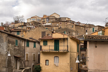 Fototapeta na wymiar View of the houses of the town of Subiaco, near Rome, in Italy. Classic Italian village built in the mountains.
