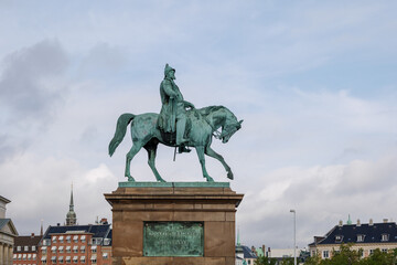 Fototapeta premium Selective focus at Frederik VII against cloudy sky in Copenhagen, Denmark. 