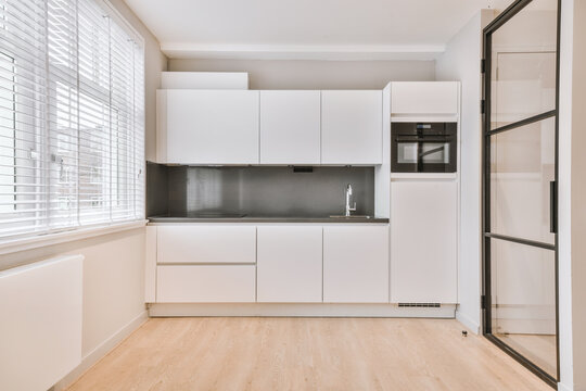 Interior Of Spacious Kitchen In Apartment