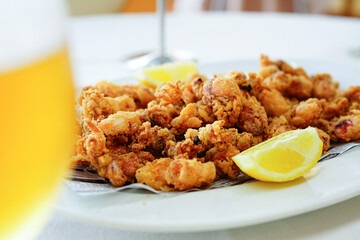 Chipirones fritos (Fried baby squid), Spanish typical tapas	
