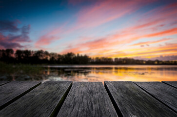 Empty wooden table with beautiful landscape background