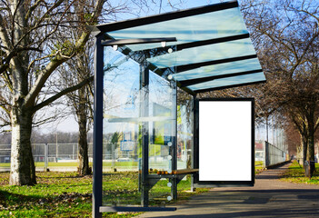 bus shelter at a busstop. blank billboard ad display. empty white lightbox sign. glass and aluminum...