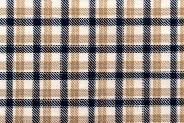Plaid material. Texture or background of checkered fabric. Canvas. pattern