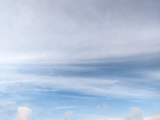Background of blue sky with fluffy clouds - 578383279