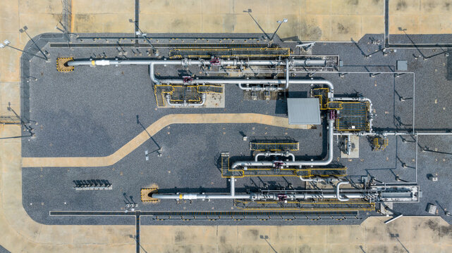 Aerial top view gas control station equipment, Natural gas supplies pipeline, Regulators and pressure reducers on gas pipelines industrial, Natural gas pipeline, Gas industry factory.