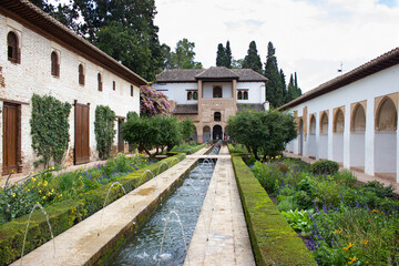 Fototapeta na wymiar Views of the spectacular Patio de La Acequia in the gardens of the Generalife, Alhambra, Granada, Andalusia, Spain.