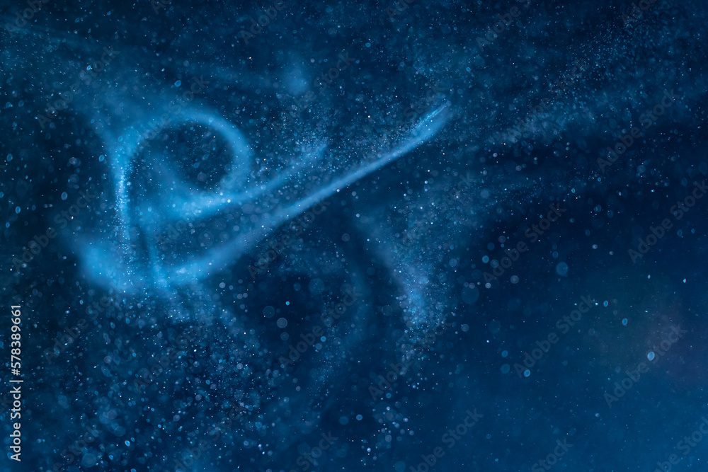 Wall mural dust blue particles on black background. glittering sparkling bokeh overlay with copy space for text