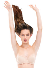 Obraz premium The beauty model advertises shampoo for shiny hair growth and cosmetics from a top female hairdresser's salon isolated&nbsp;on a PNG background&nbsp;