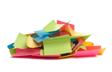 Used colorful stickers notes heap isolated. Side view. Stationery colored sticky notes.