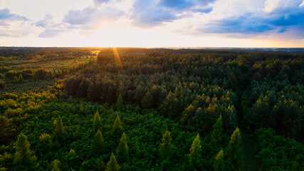 Fototapeta na wymiar A stunning sunset aerial photo of fields in Poland near Gorzów Wlkp, captured by a drone