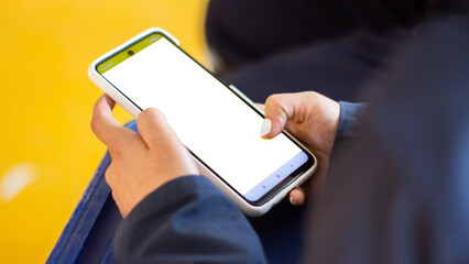 people holding cell phone and tablet