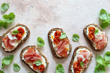 Healthy snack. Sandwiches with wholemeal bread, ham and cheese. Top view.